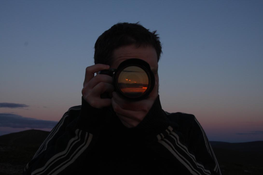 Gerald (photo by Heidi Nousiainen) Person holding a camera in front of face